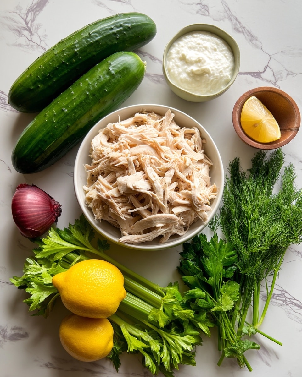 A top view of fresh ingredients neatly arranged on a white marbled surface. In the center, there is a white bowl filled with shredded pale cooked chicken with a soft texture. Around it, clockwise from the top left, there is a long dark green cucumber, a small white bowl filled with creamy white yogurt, a bright yellow lemon, a bunch of flat green parsley, a bunch of celery leaves with light green stalks, a small wooden bowl holding a white garlic bulb, a red onion with a smooth purple skin, and a small bunch of feathery dill with a bright green color. Everything is clean and fresh, showing a variety of textures from creamy to leafy. Photo taken with an iphone --ar 4:5 --v 7