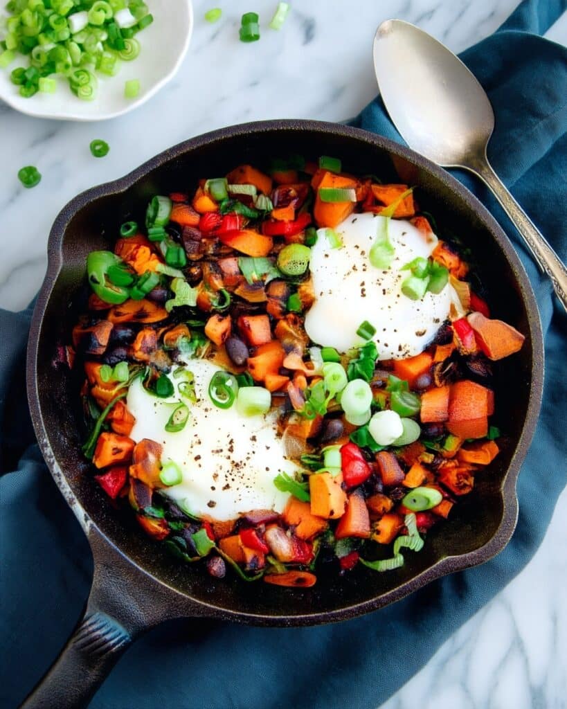 Harissa Sweet Potato Hash with Eggs and Spinach Recipe